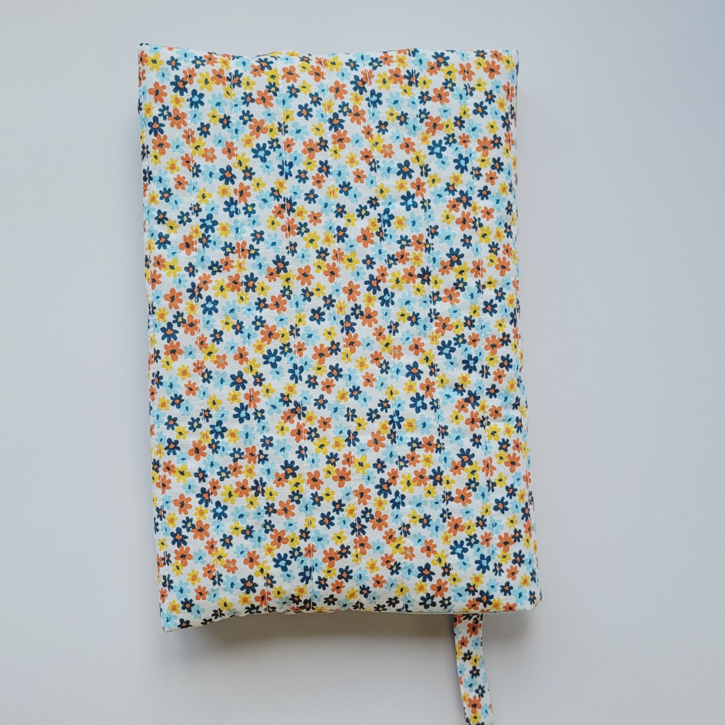 Capa de livro ajustável Daisy